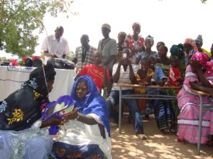 During the intervillage meeting, community members portray a realistic scenario about a young girl whose family decides not to have her cut.