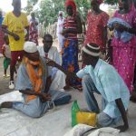 Mamoudou Balde (left), Boubacar Sabaly, Mahamadou Balde. Rehearsal for skit on FGC. Orchid RIV Sinthiang Demba,Kolda, SN. 9 Oct 2013