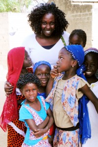 Cess, working with Orchid partner ECAW in Kenya, talking with girls in the village